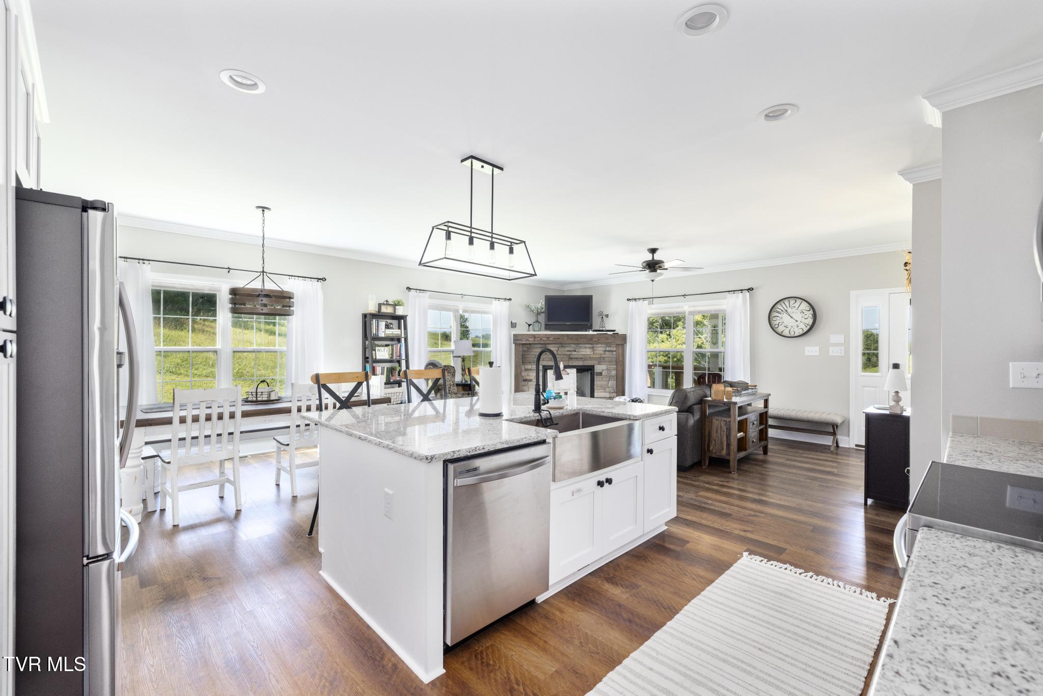 306 Silver Oak Trail Butler, TN 37640 - Photo 17 of 54 Kitchen into living room and dining