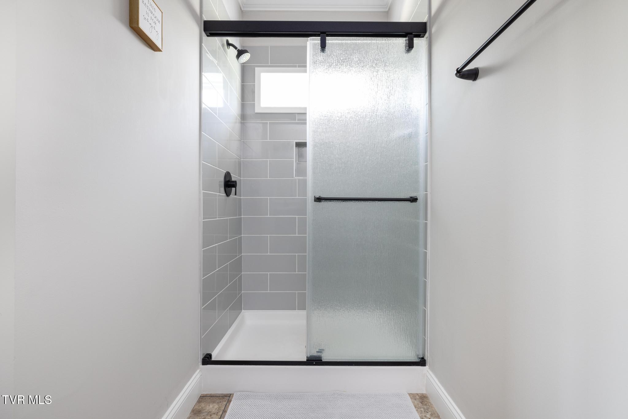 306 Silver Oak Trail Butler, TN 37640 - Photo 24 of 54 Tile shower in primary bathroom