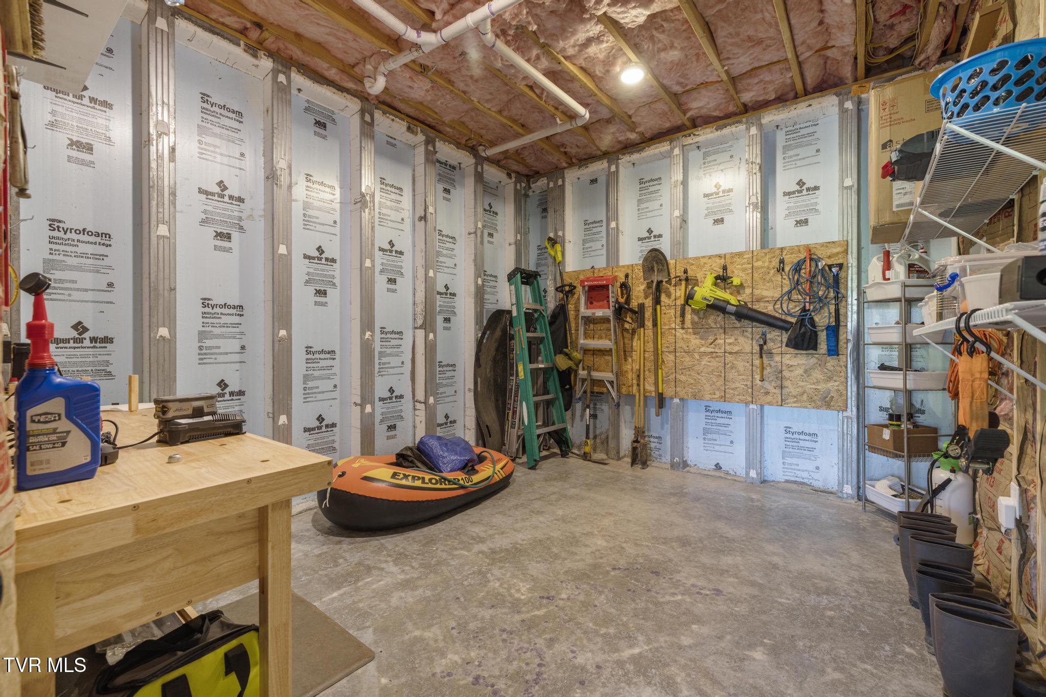 306 Silver Oak Trail Butler, TN 37640 - Photo 39 of 54 Unfinished basement with workshop