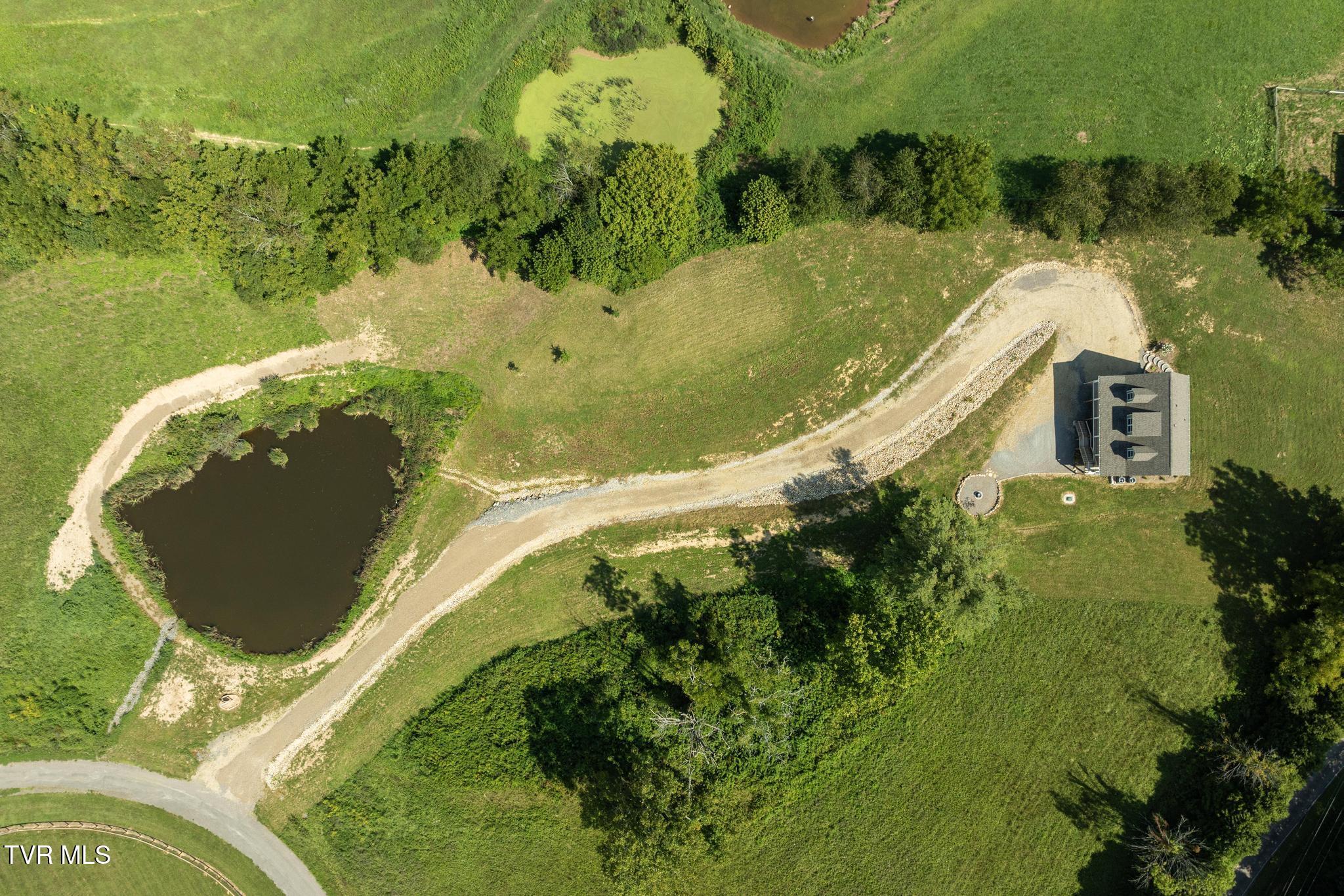 306 Silver Oak Trail Butler, TN 37640 - Photo 53 of 54 Aerial view with home and pond