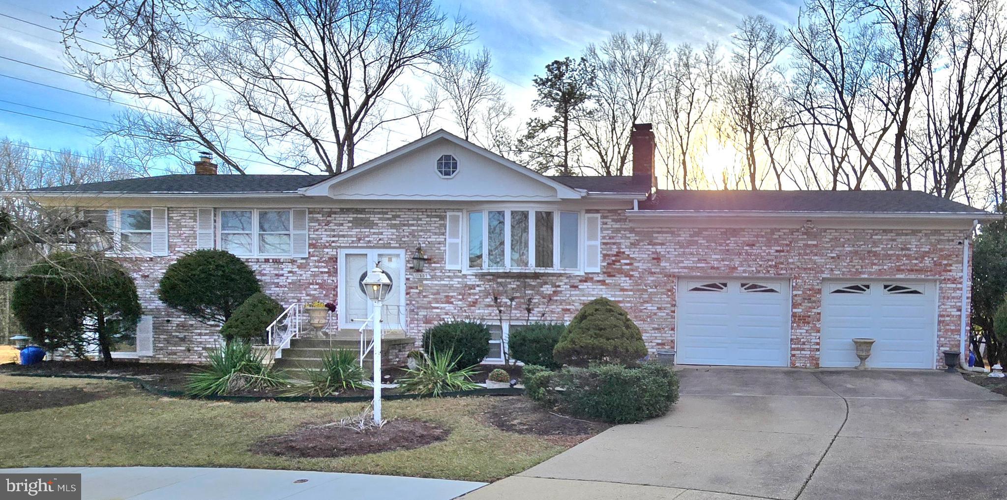 11507 Keystone Avenue Clinton, MD 20735 - Photo 1 of 33 a front view of a house with garden
