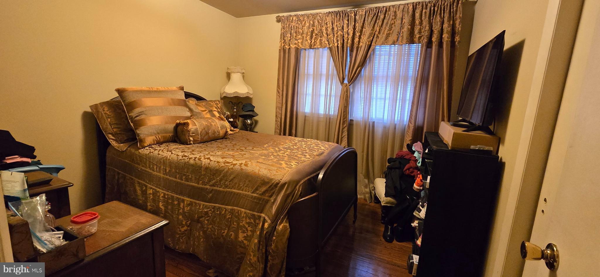 11507 Keystone Avenue Clinton, MD 20735 - Photo 18 of 33 a bed sitting in a bedroom next to a window