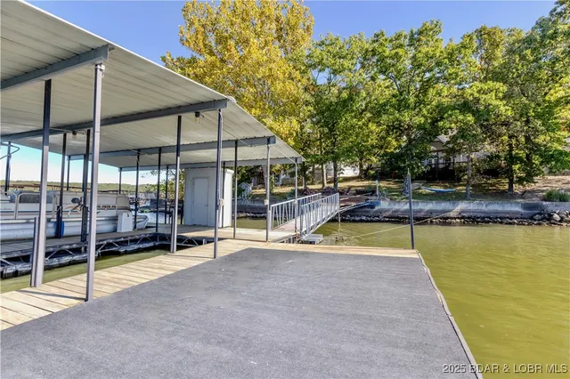 $699,900 | 699 Swaying Oak Drive, Roach, MO 65787