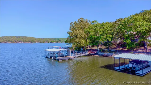 $699,900 | 699 Swaying Oak Drive, Roach, MO 65787