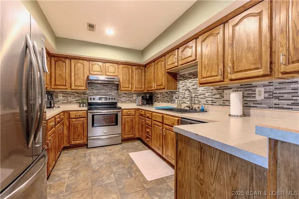 $674,900 | 699 Swaying Oak Drive, Roach, MO 65787