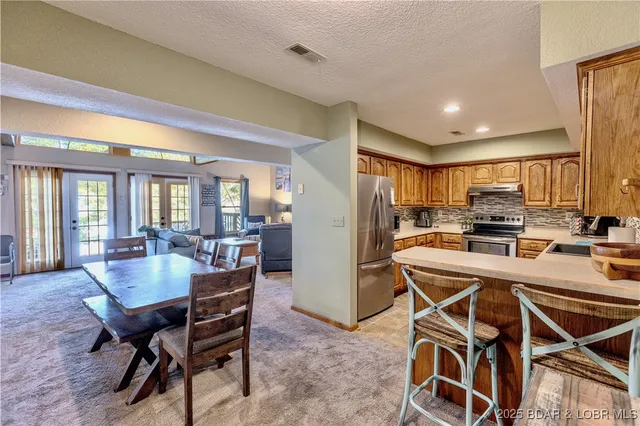 $699,900 | 699 Swaying Oak Drive, Roach, MO 65787