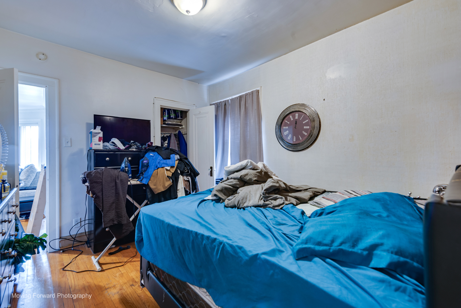 8213 South Indiana Avenue Chicago, IL 60619 - Photo 18 of 25 a bed room with a bed and a tv