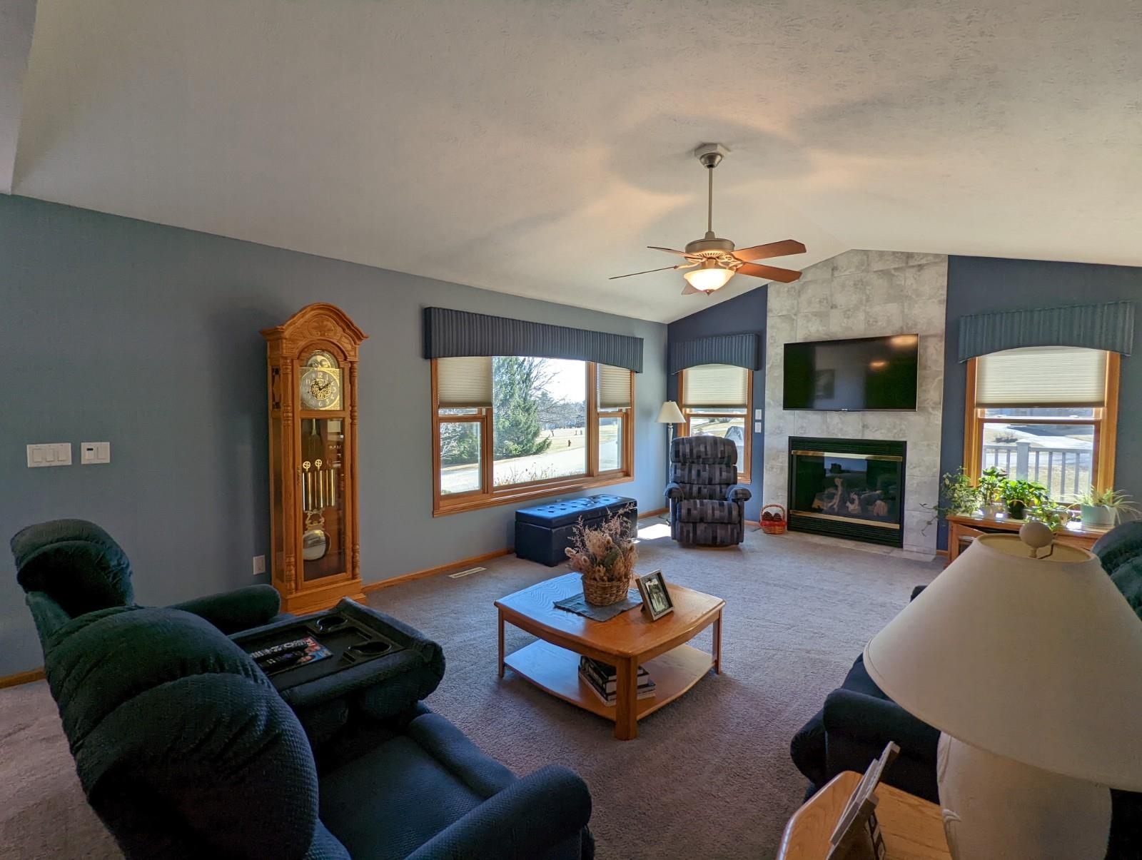 2009 Baintree Road Lake Summerset, IL 61019 - Photo 8 of 30 a living room with furniture and a fireplace