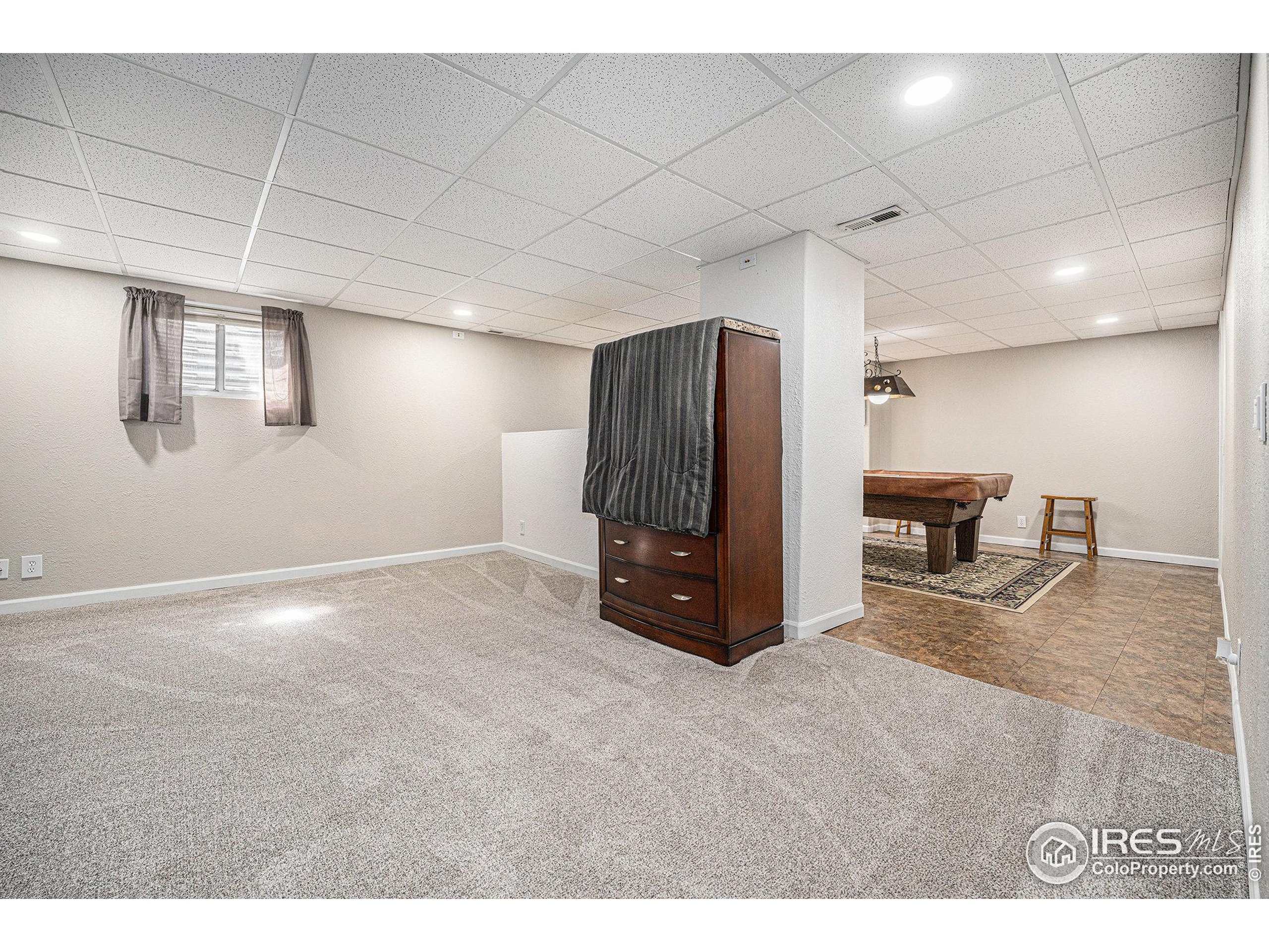 1030 South Fulton Avenue Fort Lupton, CO 80621 - Photo 16 of 26 a view of a livingroom with furniture