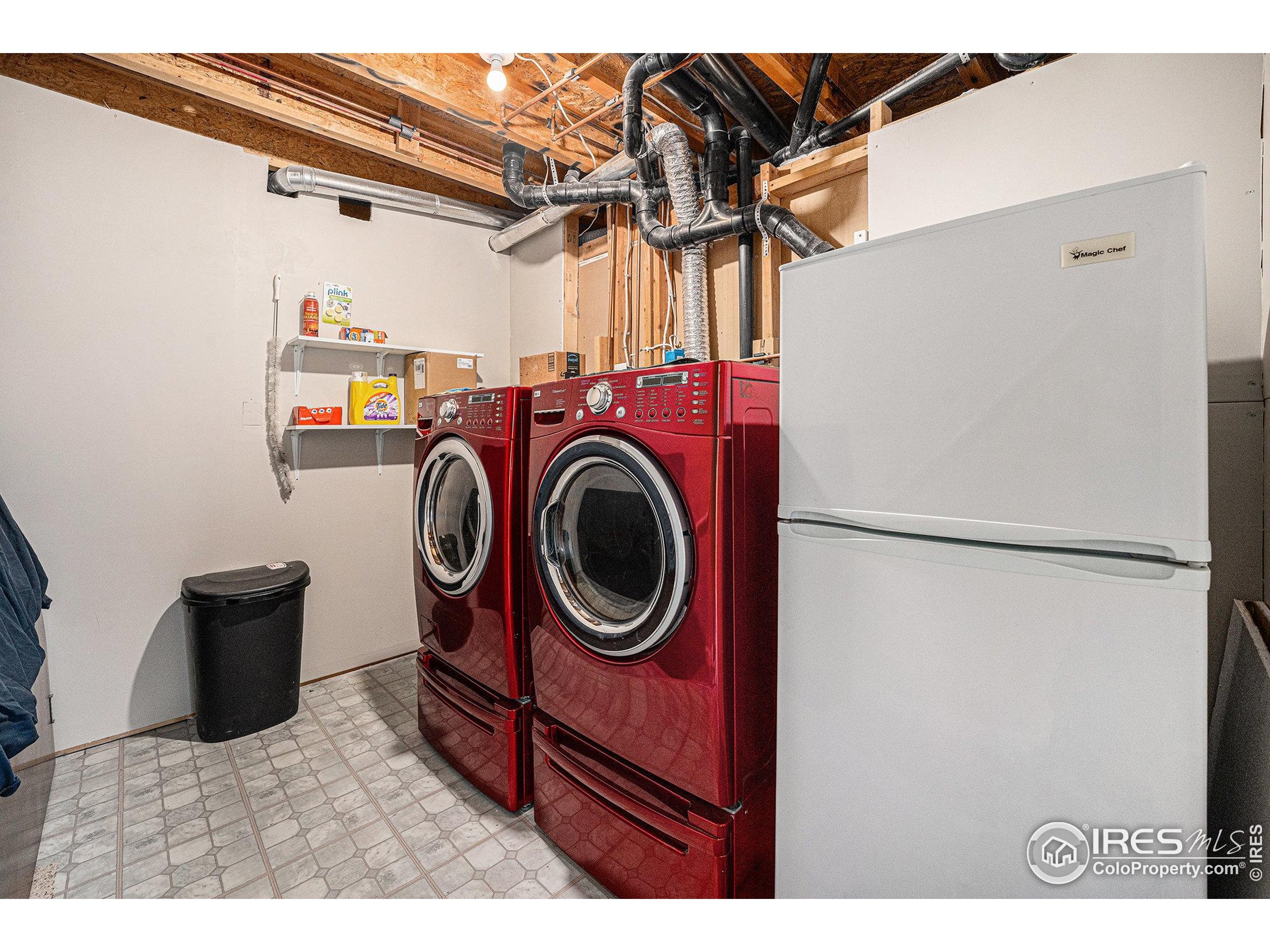 1030 South Fulton Avenue Fort Lupton, CO 80621 - Photo 18 of 26 a utility room with dryer and washer