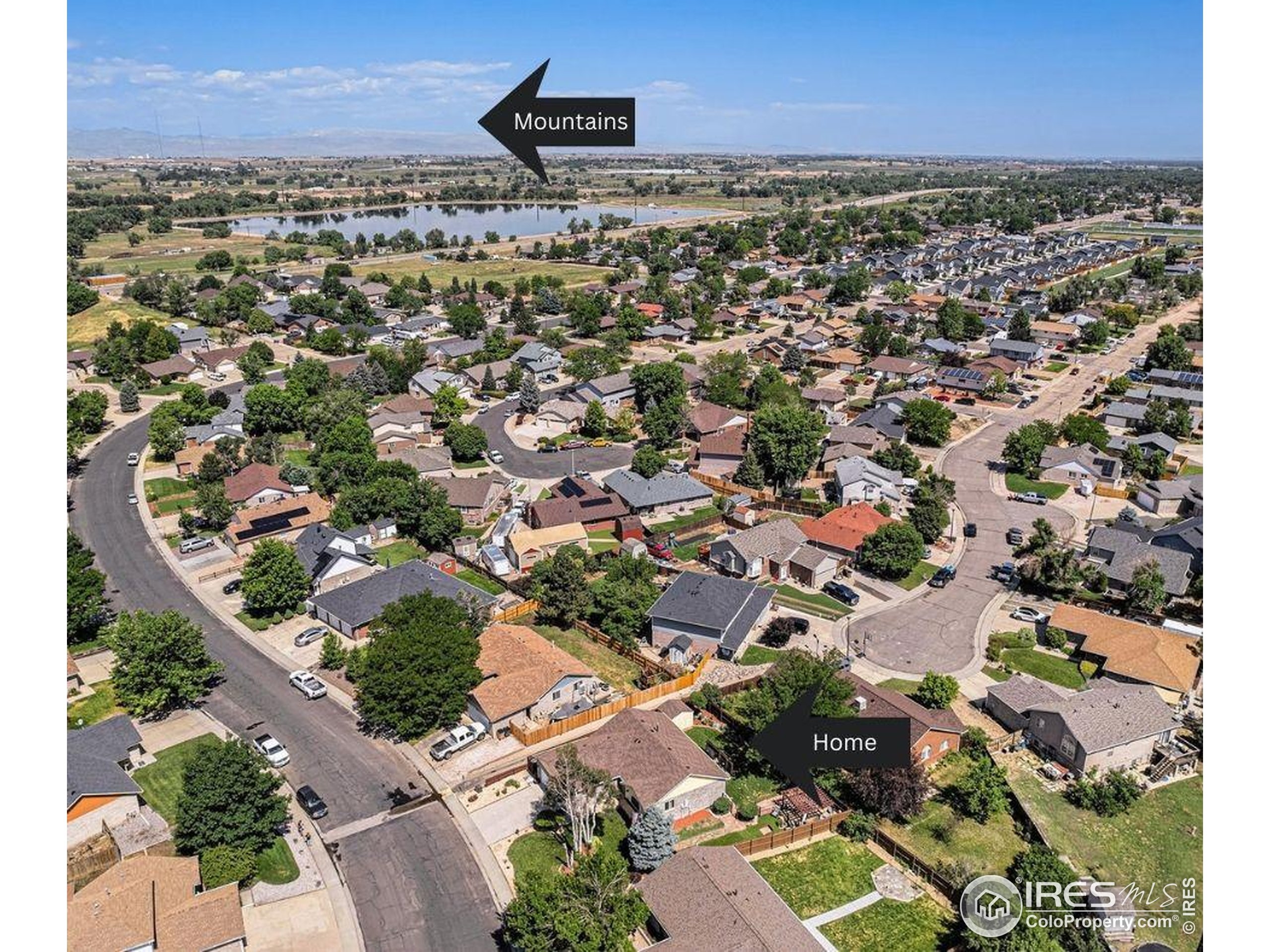 1030 South Fulton Avenue Fort Lupton, CO 80621 - Photo 23 of 26 an aerial view of a city with lots of residential buildings