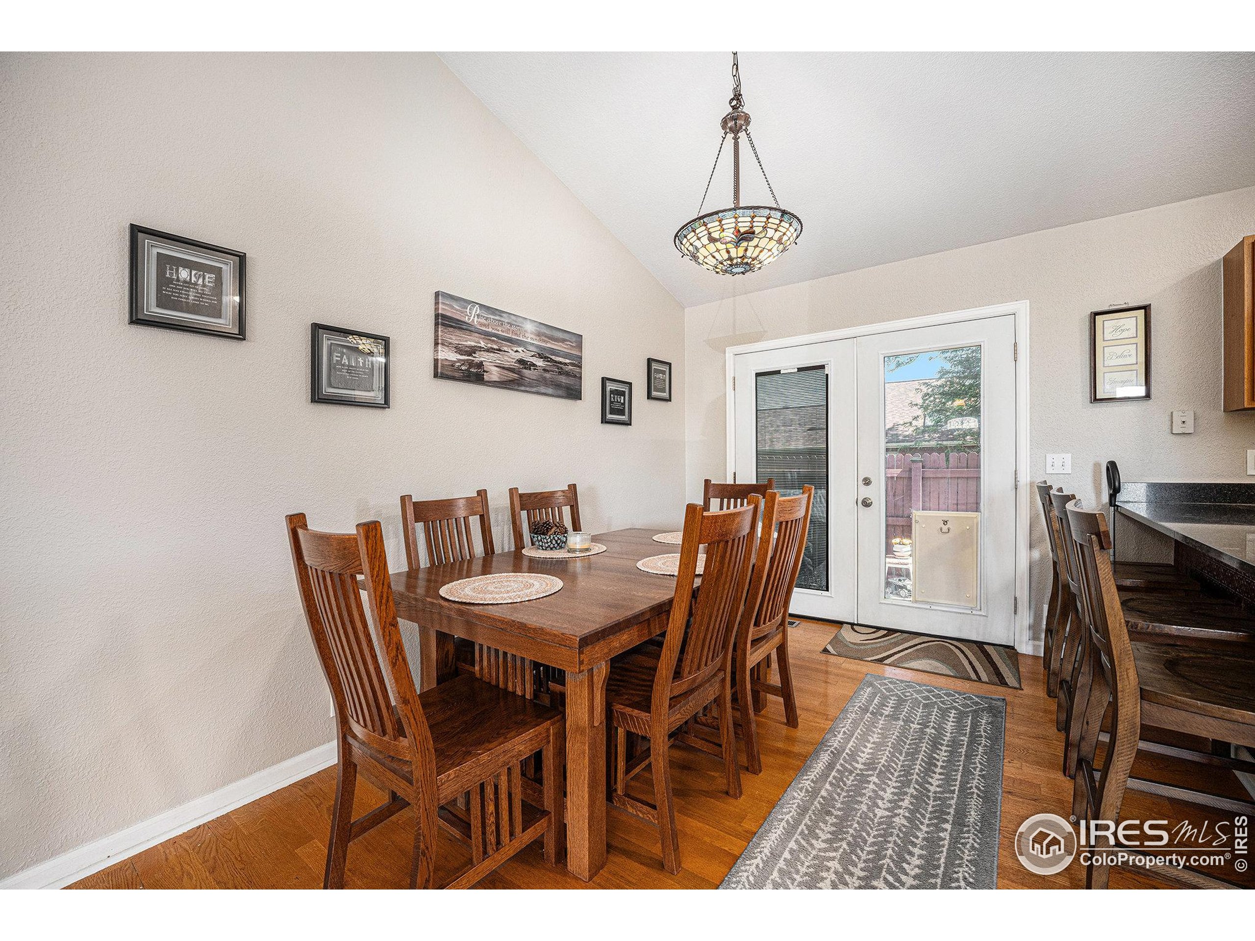 1030 South Fulton Avenue Fort Lupton, CO 80621 - Photo 7 of 26 a view of a dining room with furniture