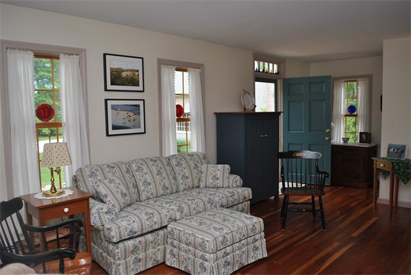 829 Division Road Westport, MA 02790 - Photo 5 of 15 a living room with furniture and a window