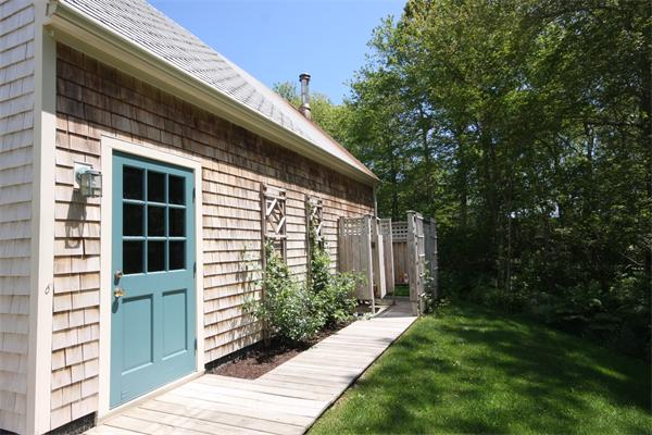 829 Division Road Westport, MA 02790 - Photo 6 of 15 a front view of a house with a yard