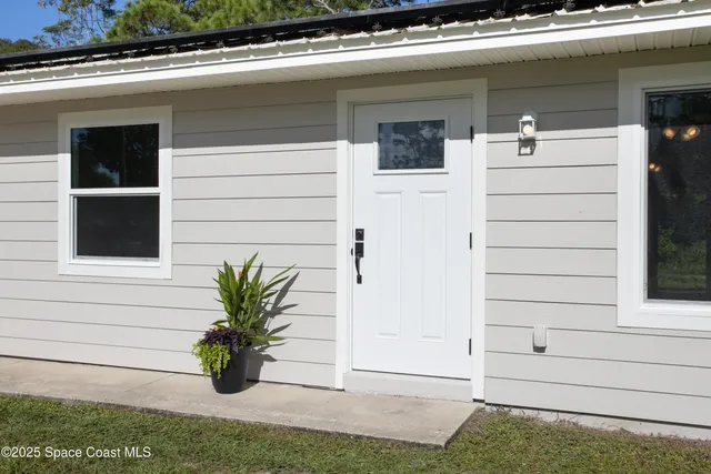 a white building with a outdoor space