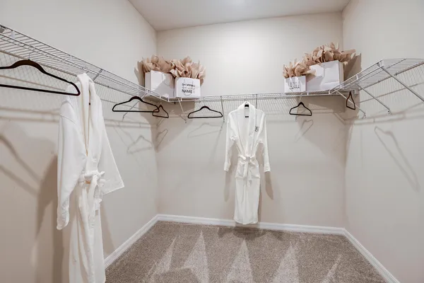 a bathroom with a mirror and a shower