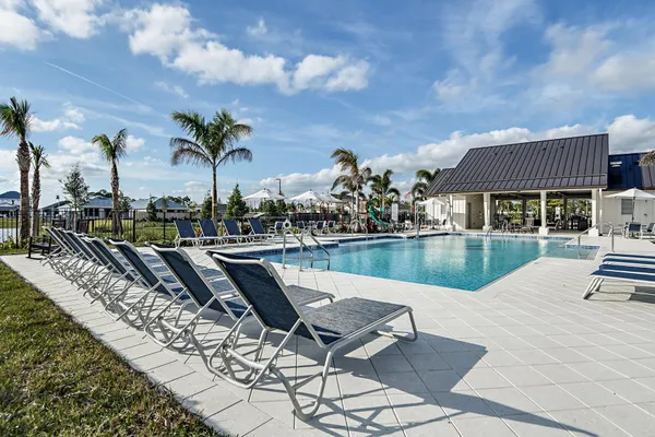a view of an chairs and tables in patio