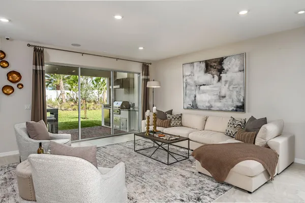 a kitchen with kitchen island granite countertop a sink stainless steel appliances and counter space
