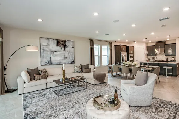 a kitchen with a dining table chairs and view kitchen