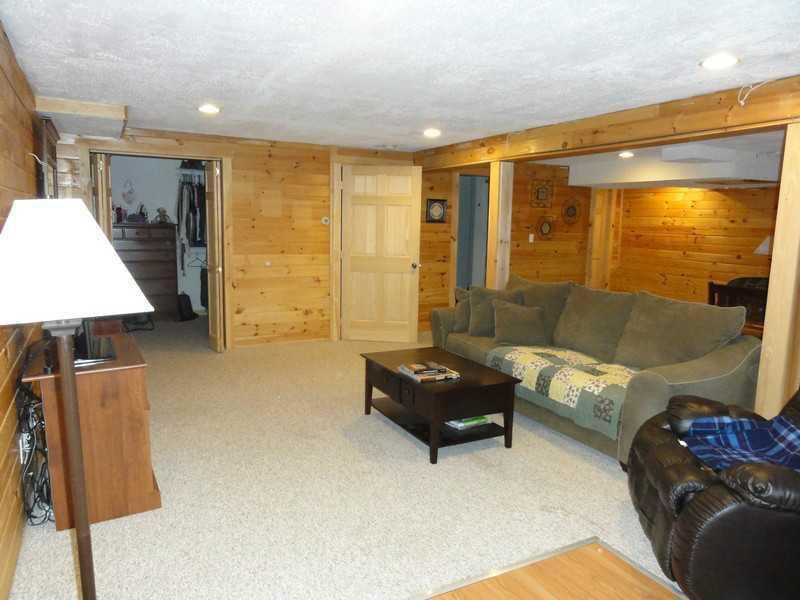 148 Point Road Belgrade, ME 04917 - Photo 15 of 27 Family Room. Family room with...