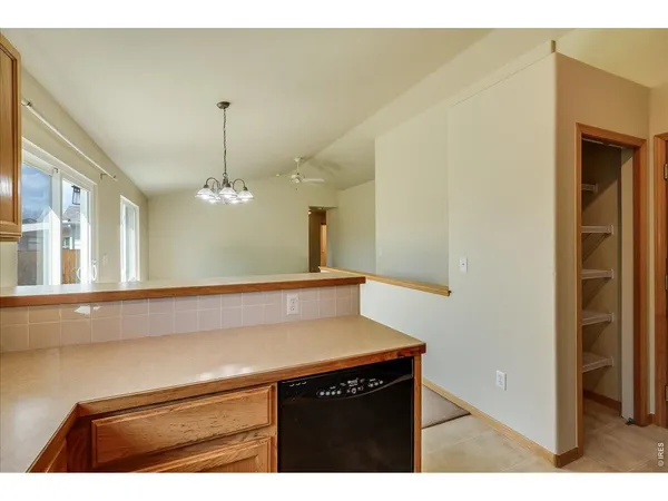 a bathroom with a sink toilet vanity and shower