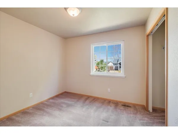 a bathroom with a sink toilet and mirror