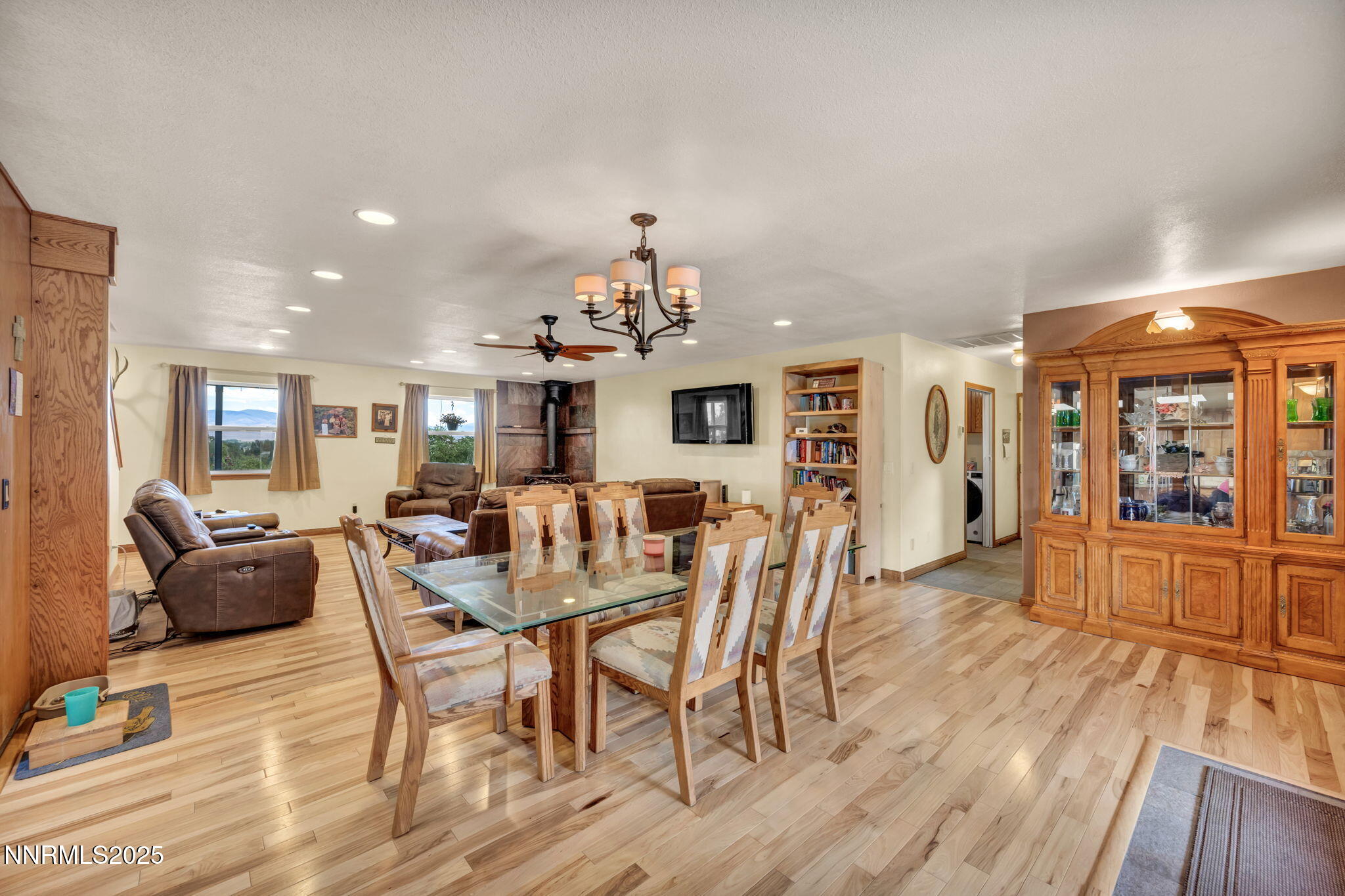 111 Upper Colony Road Wellington, NV 89444 - Photo 12 of 49 a view of a dining room with furniture window and wooden floor