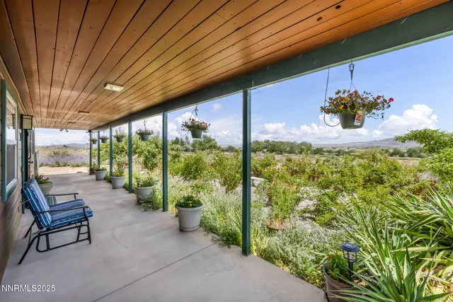 a lobby with chair and window