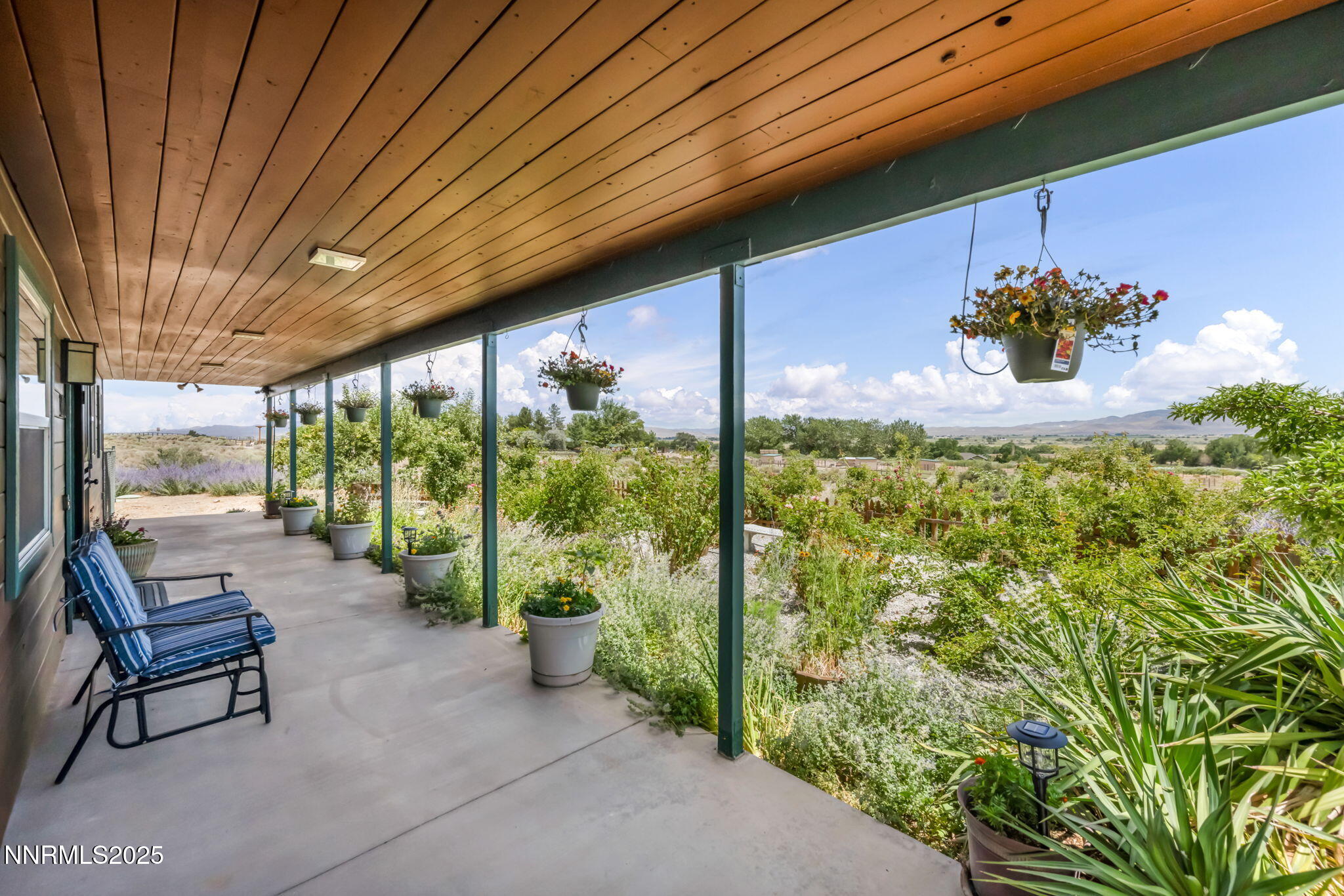 111 Upper Colony Road Wellington, NV 89444 - Photo 26 of 49 a lobby with chair and window