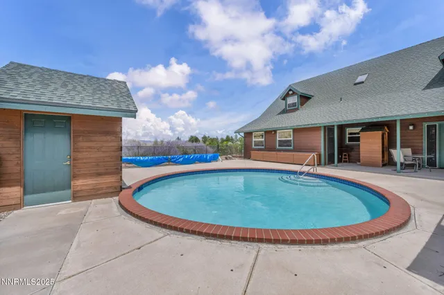 a view of outdoor space yard swimming pool and porch