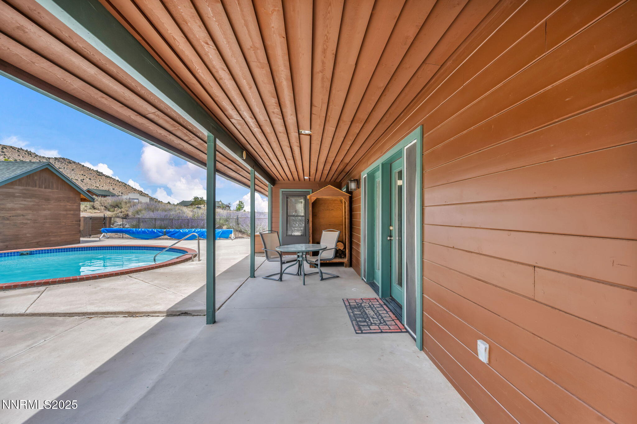 111 Upper Colony Road Wellington, NV 89444 - Photo 30 of 49 a porch with seating space
