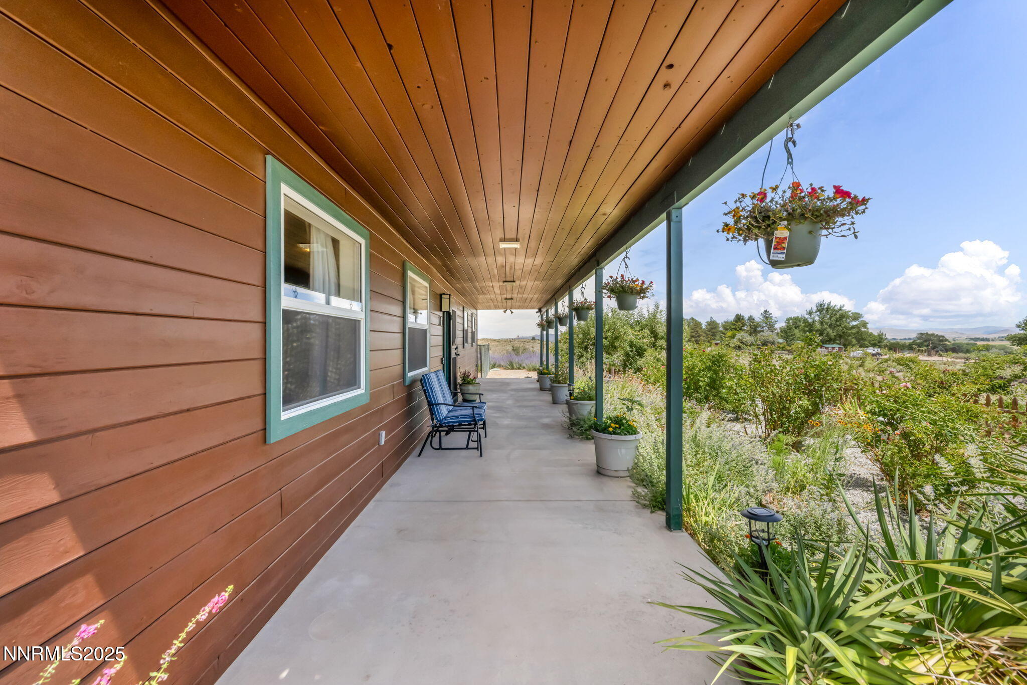 111 Upper Colony Road Wellington, NV 89444 - Photo 40 of 49 a view of a porch with furniture and garden