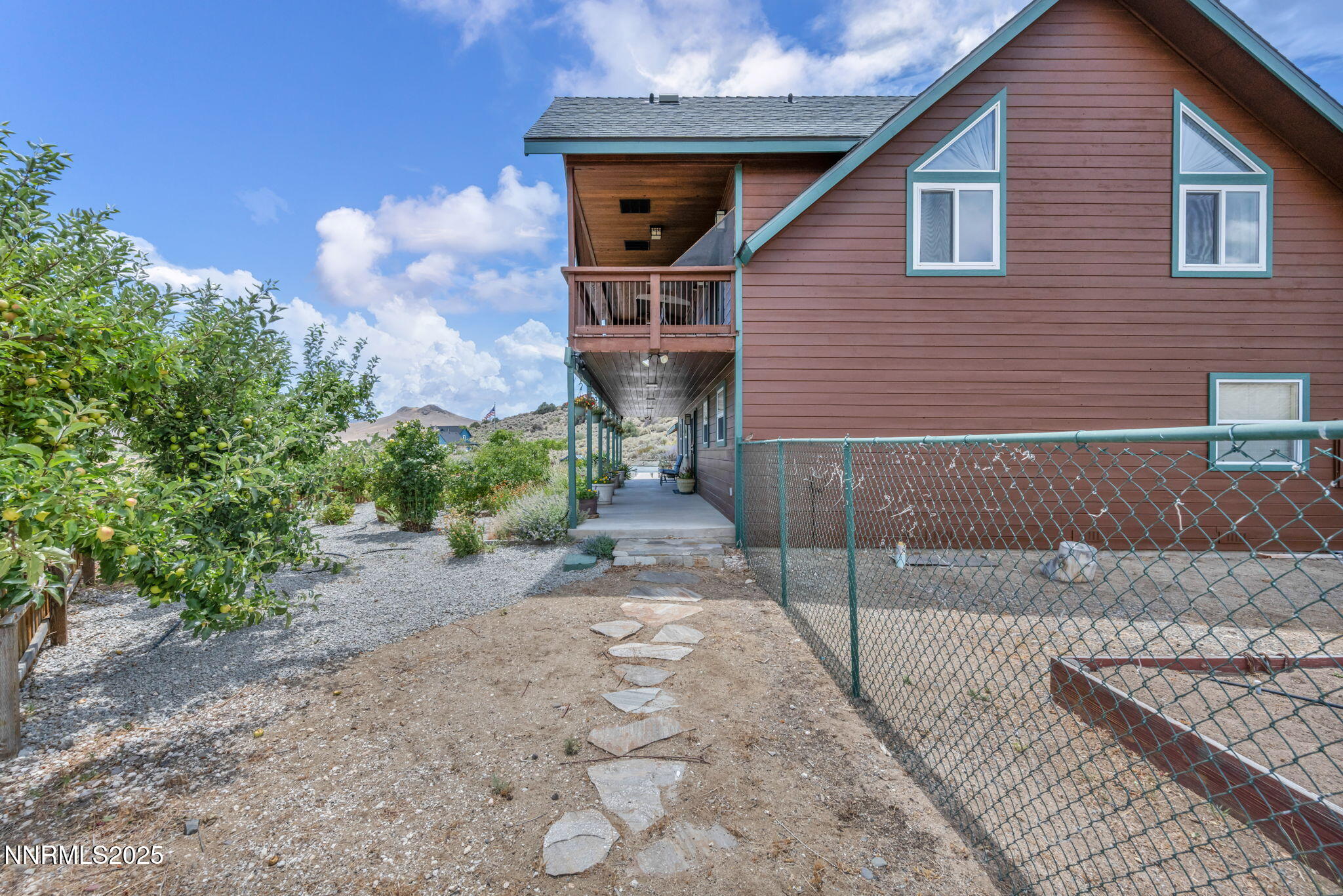 111 Upper Colony Road Wellington, NV 89444 - Photo 41 of 49 a front view of a house with garden