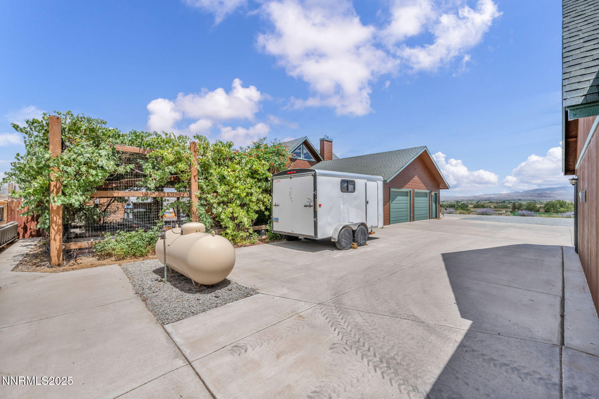 111 Upper Colony Road Wellington, NV 89444 - Photo 43 of 49 a view of a house with backyard and sitting area