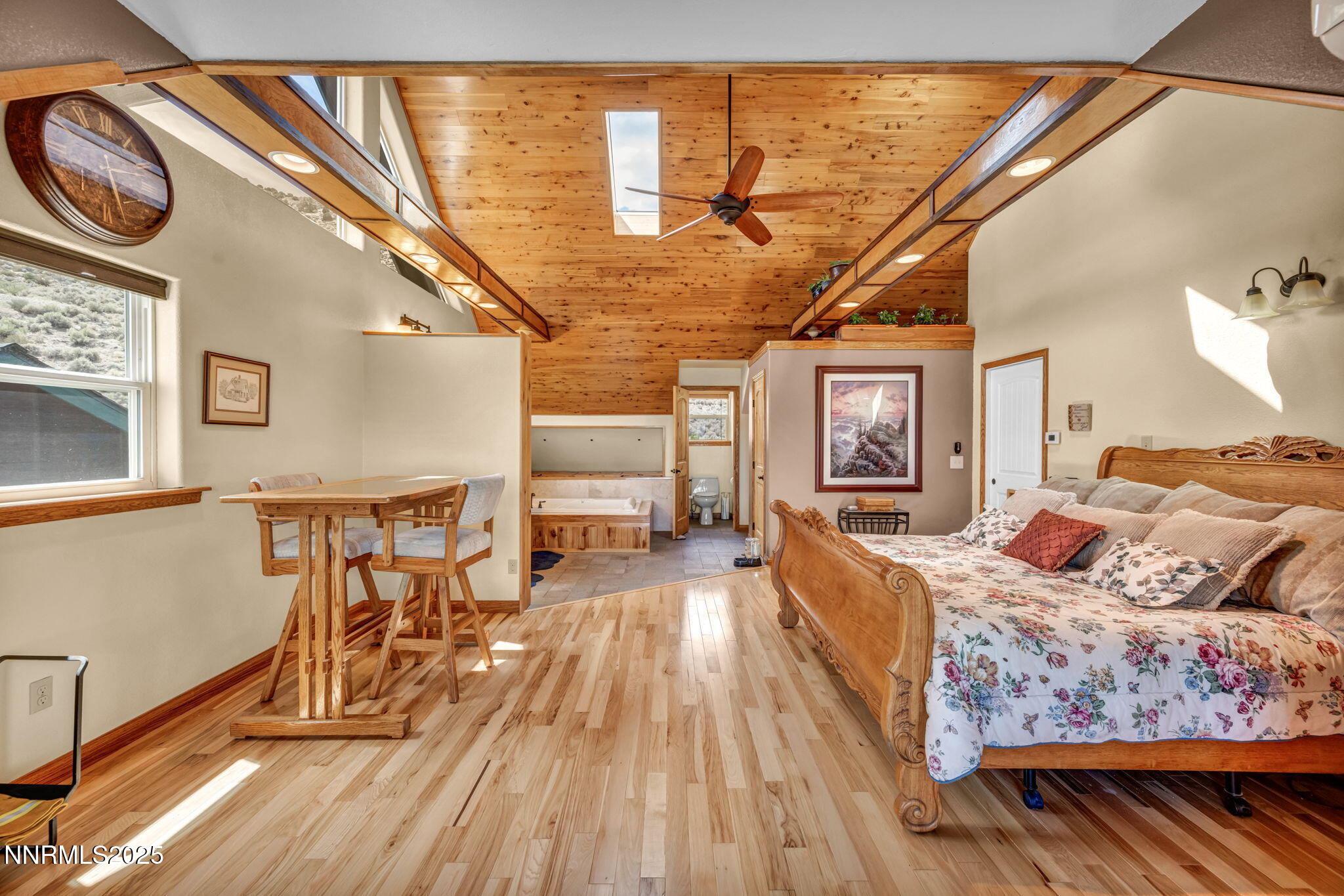 111 Upper Colony Road Wellington, NV 89444 - Photo 48 of 49 a bedroom with furniture and wooden floor