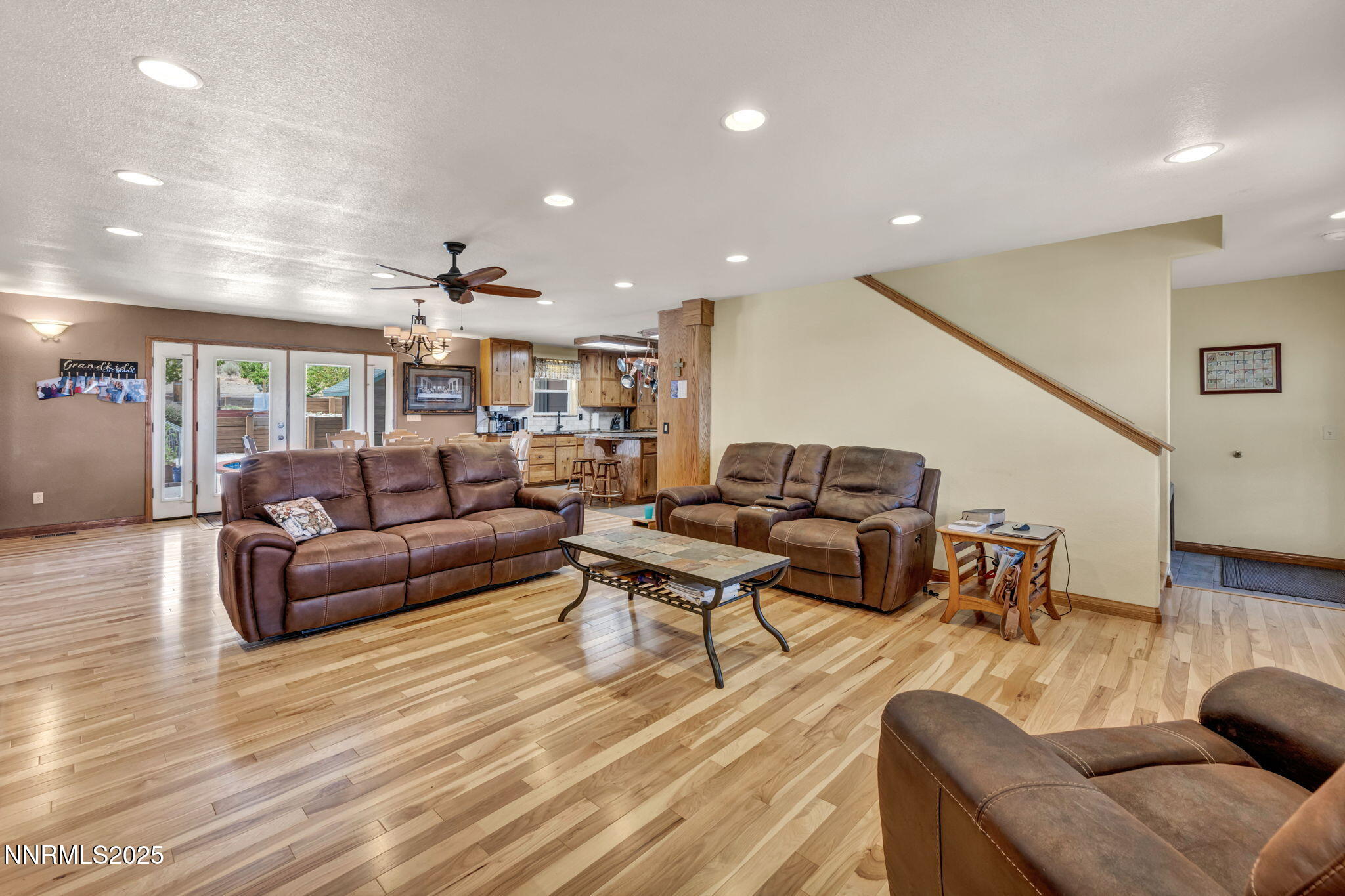 111 Upper Colony Road Wellington, NV 89444 - Photo 6 of 49 a living room with furniture and wooden floor