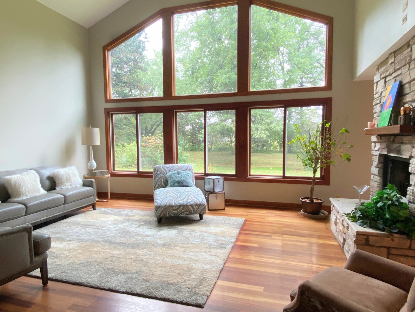 30W571 Army Trail Road Wayne, IL 60184 - Photo 4 of 20 a living room with furniture and a large window
