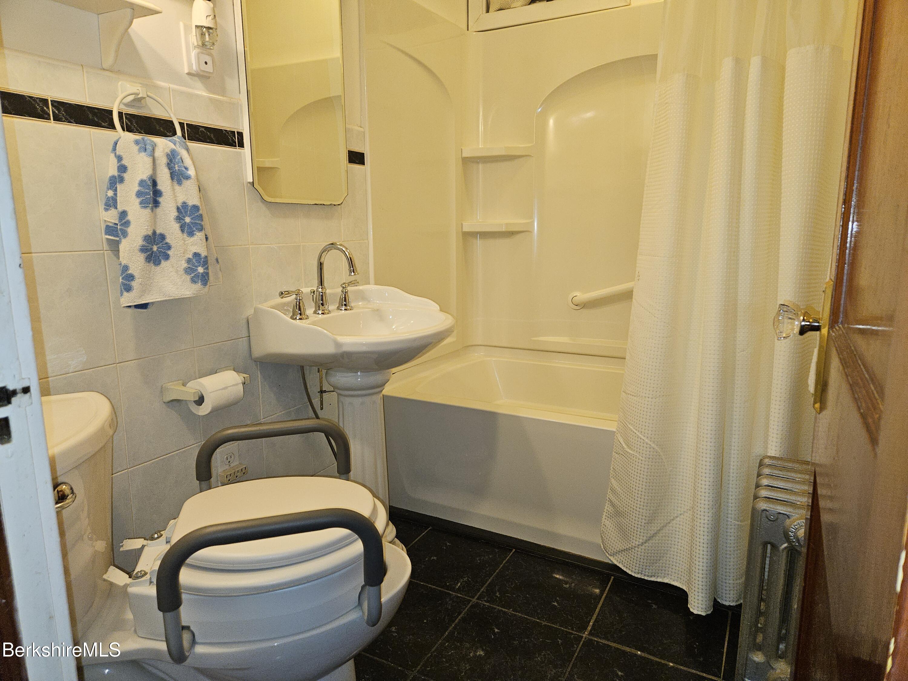 269 2nd Street Pittsfield, MA 01201 - Photo 25 of 39 a bathroom with a sink toilet and shower