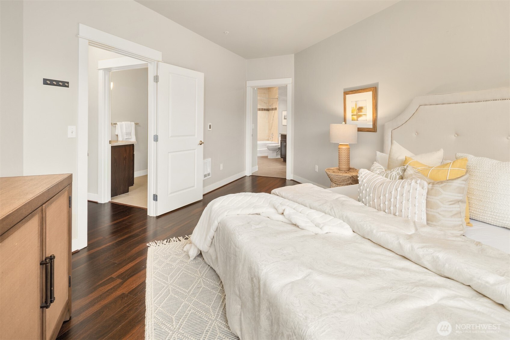 15700 116th Avenue Northeast, Unit 404 Bothell, WA 98011 - Photo 21 of 31 a bedroom with a bed and a night stand
