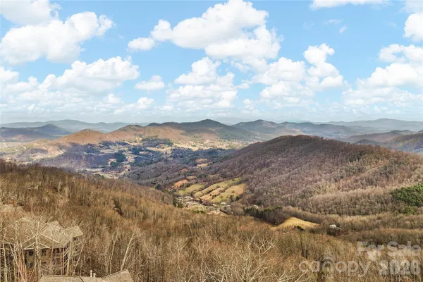 a bathroom with a bathtub sink and mirror