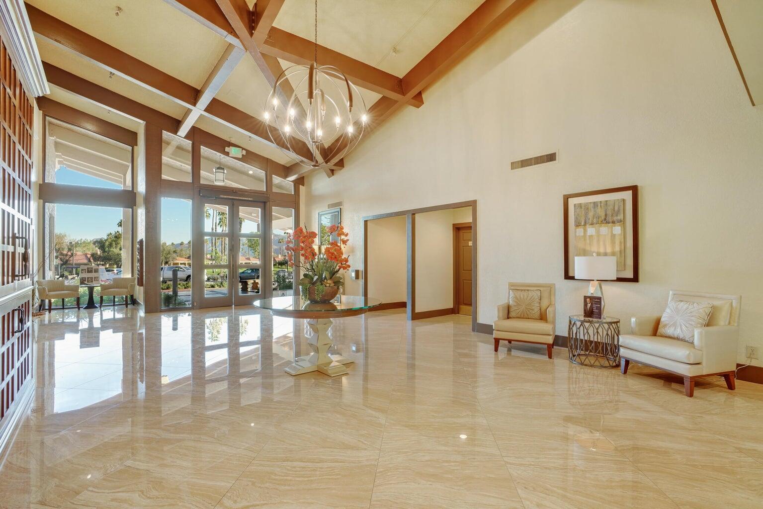 82 Conejo Circle Palm Desert, CA 92260 - Photo 45 of 58 a living room with furniture