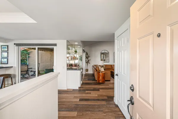 a living room with furniture a window and a fireplace