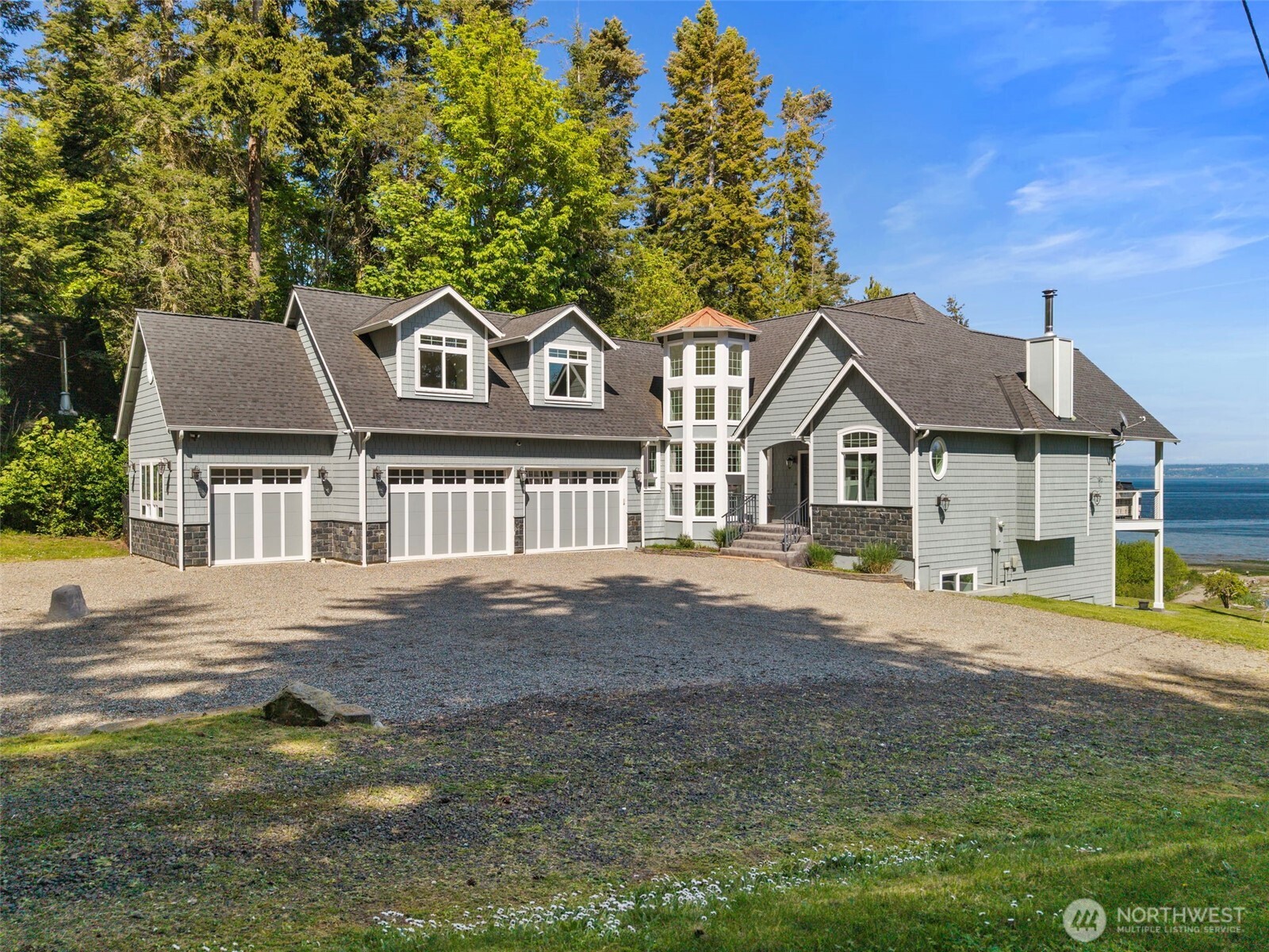 32326 Hoffman Road Northeast Kingston, WA 98346 - Photo 7 of 40 a front view of a house with a yard