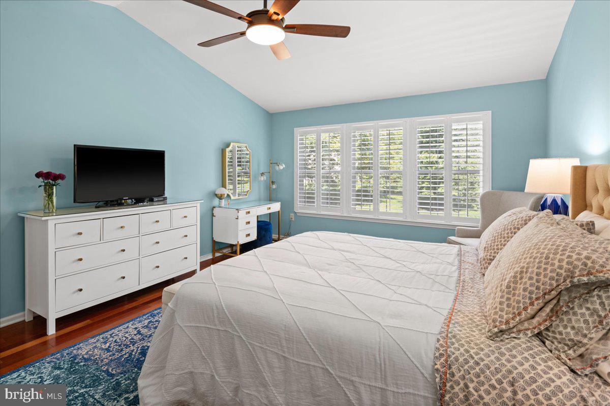 325 Watkins Road Pennington, NJ 08534 - Photo 29 of 50 a bedroom with a bed and a flat screen tv