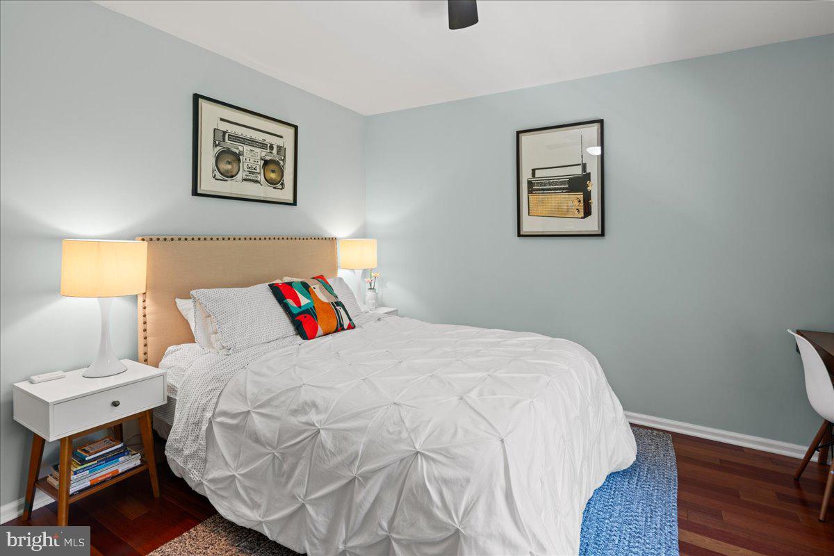 325 Watkins Road Pennington, NJ 08534 - Photo 35 of 50 a bedroom with a bed and a painting on the wall