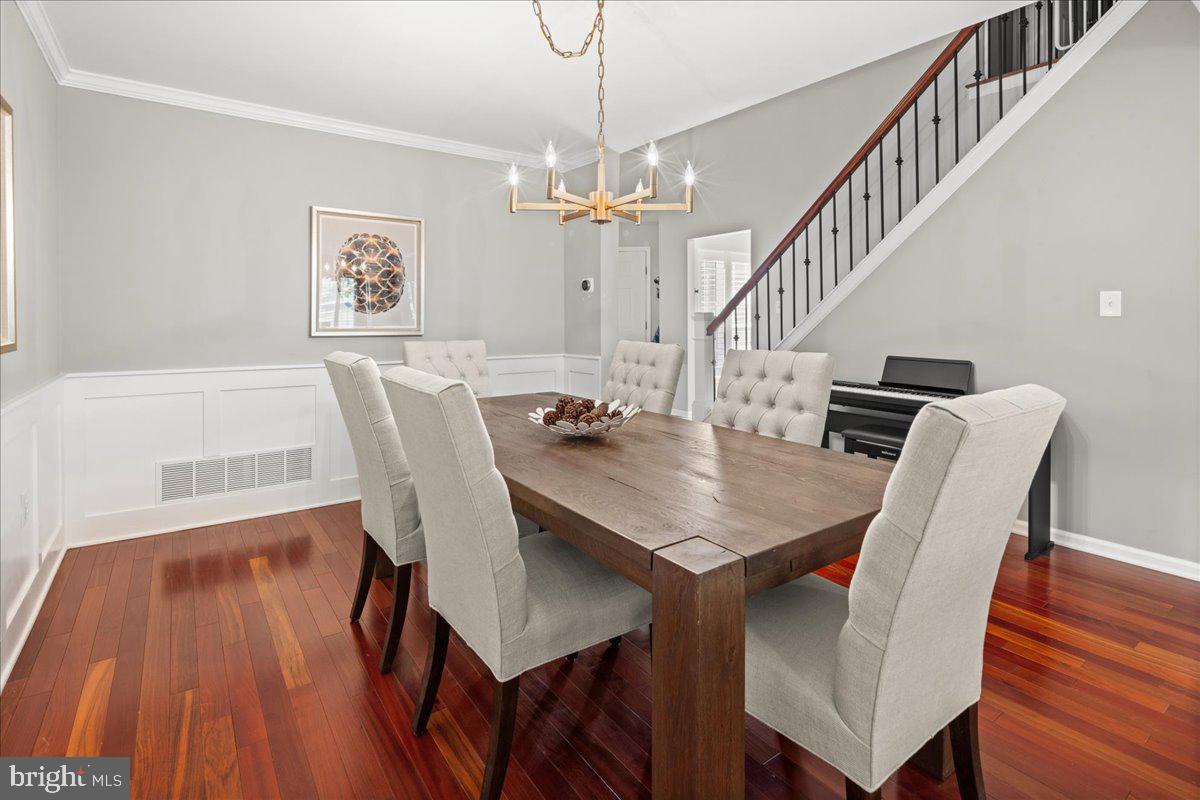 325 Watkins Road Pennington, NJ 08534 - Photo 4 of 50 a view of a dining room with furniture wooden floor and chandelier