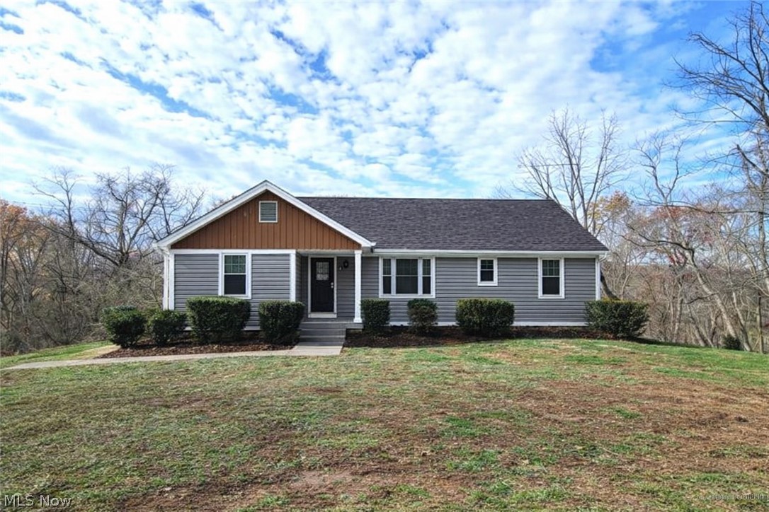 641 Warren Chapel Road Fleming, OH 45729 - Photo 2 of 27 What house could look like with new siding and roof.