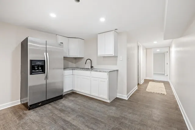 a view of a workspace with furniture