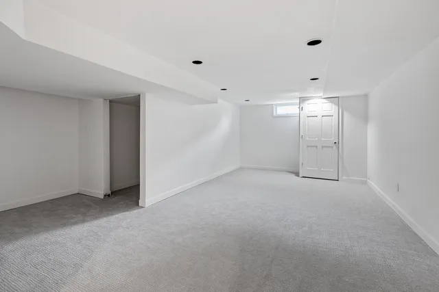 a view of a patio with wooden floor