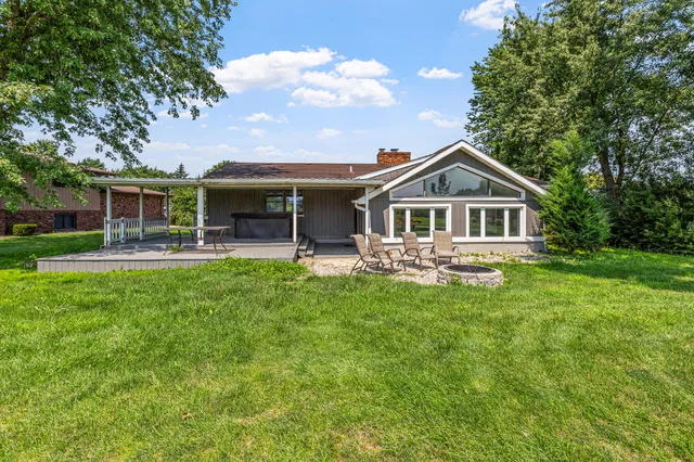 a view of a golf course with a lake